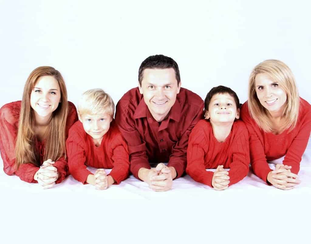 Family in a row, white background