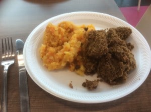 Haggis, neeps and tatties on a plate with knife and fork