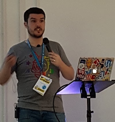 Dave Green wearing a WordCamp Edinburgh 2017 t-shirt and lanyard