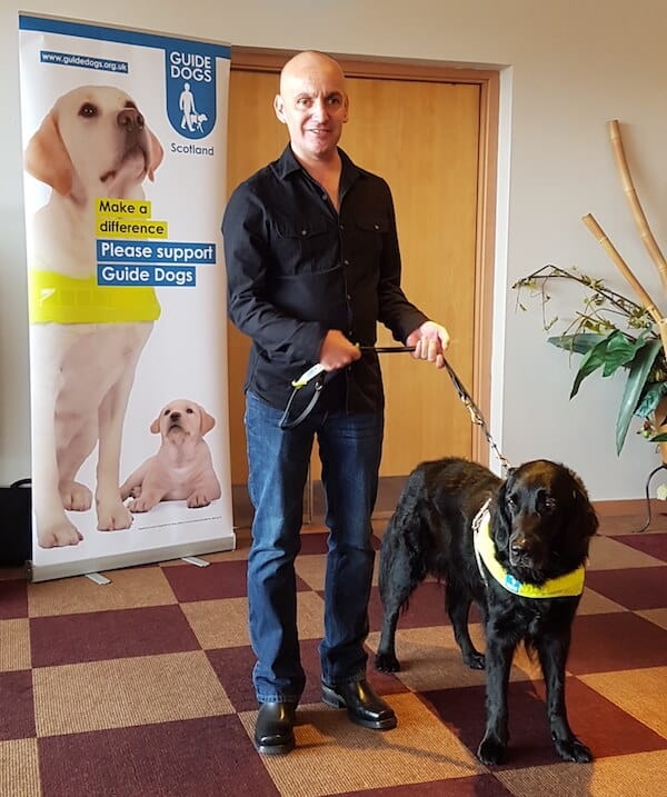 Leigh and his guide dog William
