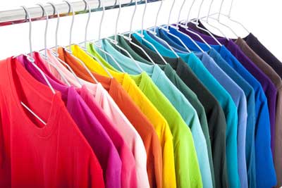 coloured t-shirts on hangers