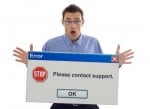 Man holding an error message: Please contact support