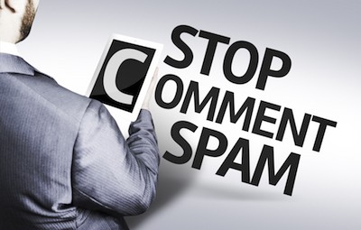Man holding the letter C in "Stop Comment Spam"